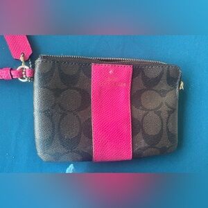 Coach wristlet in canvas logo with leather trimming EUC